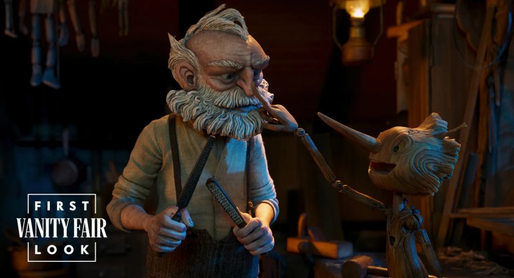 "Guillermo del Toro's Pinocchio" first look image 3, showing Pinocchio booping Geppetto in the snoot.