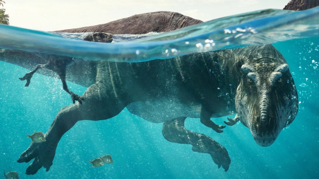 "Planète préhistorique" art clé axé sur le Tyrannosaure flottant.