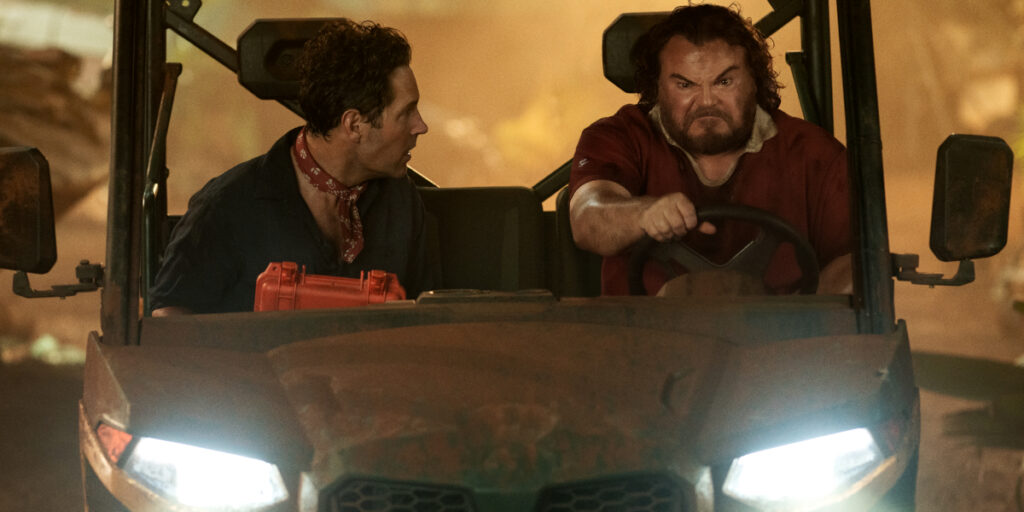 Paul Rudd looks at an angry Jack Black with worry in Anaconda.