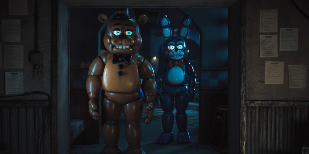 Freddy and Bonnie stand menacingly in a dark hallway in Five Nights at Freddy's 2.