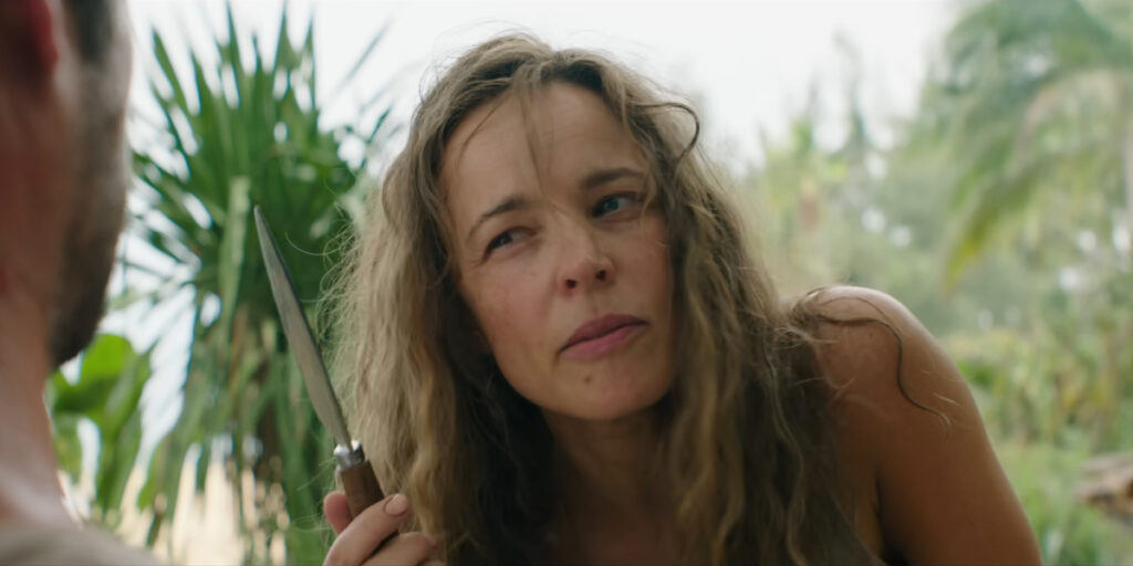 Rachel McAdams wields a knife with a slightly angry look in Send Help.