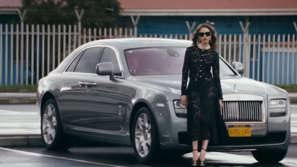 Margaret Qualley in How To Make A Killing