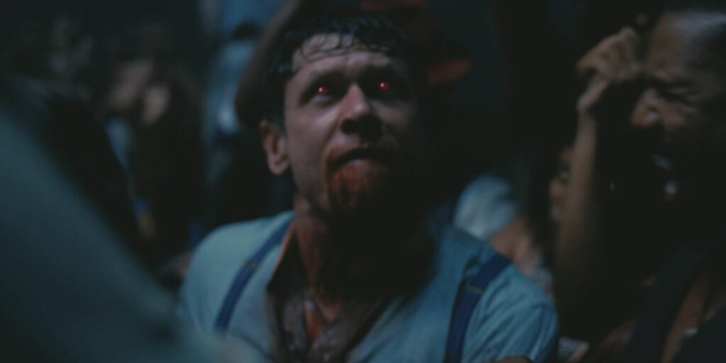 Jack O'Connell looks up bittersweetly at the end of Rocky Road to Dublin, from Sinners.