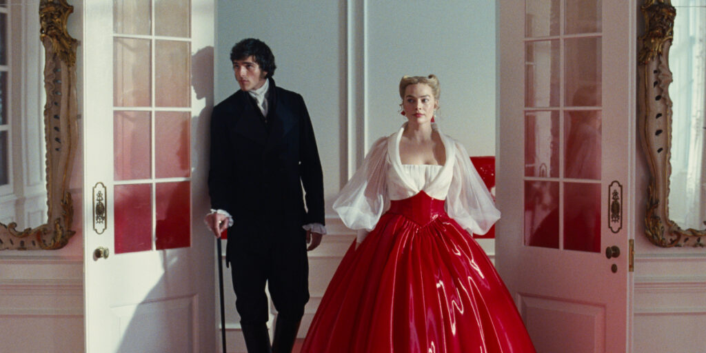 Jacob Elordi and Margot Robbie enter a room together in Wuthering Heights.