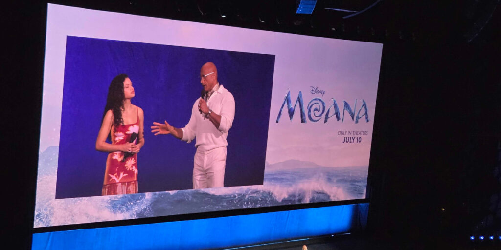 Catherine Laga'aia and Dwayne Johnson presenting for Moana at Disney's CinemaCon 2026 panel.