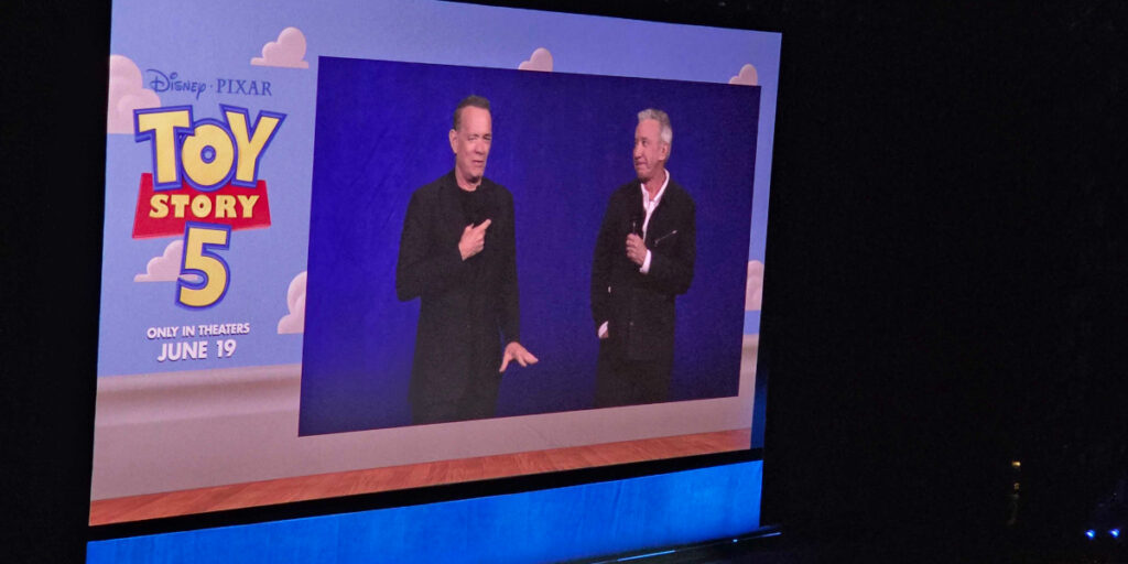 Tom Hanks and Tim Allen presenting for Toy Story 5 at Disney's CinemaCon 2026 panel.