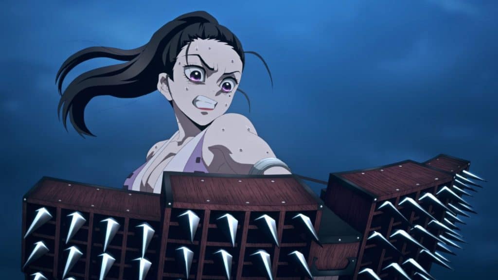 "Demon Slayer: Entertainment District Arc" screenshot featuring one of Tengen's wives and her awesome multiple kunai launcher. I want one of those.