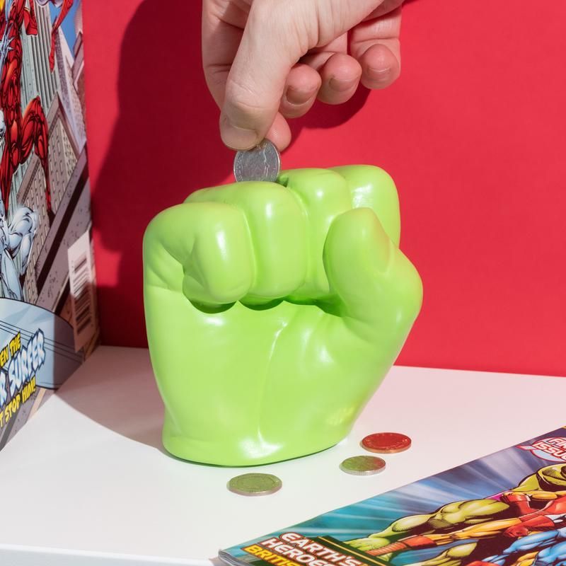 Hulk money fist with someone dropping a quarter into it.